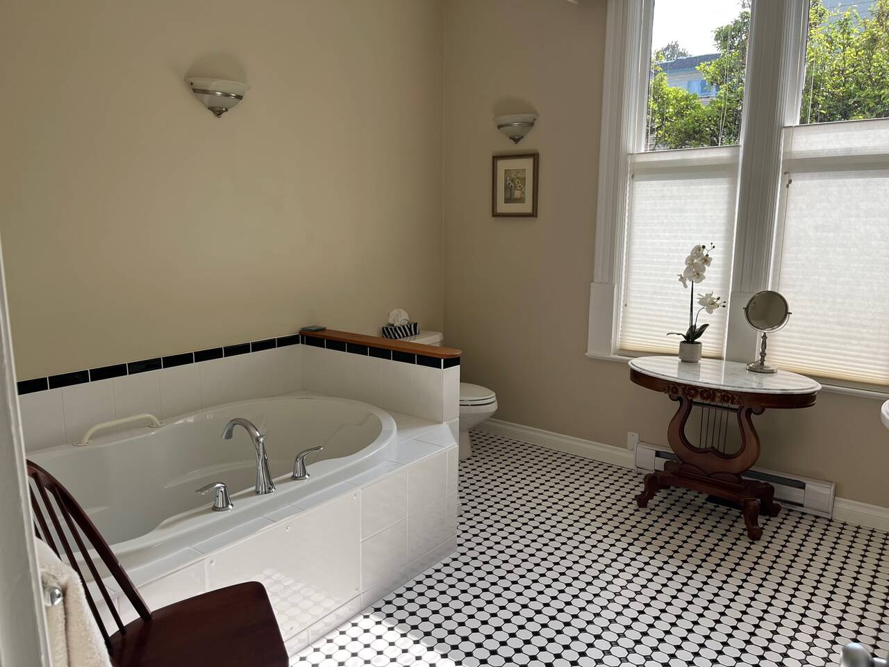 Large bathroom with soaker tub and separate double